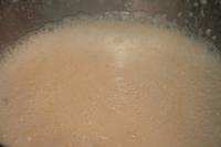 Milch, Quark, Zucker, Maisstärke, Eigelb und...