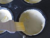 Diese in Muffin-Förmchen legen und von der...