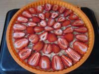 Erdbeerscheiben auf den Kuchen legen....