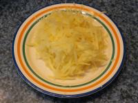Kartoffeln schälen, abwaschen und grob reiben....