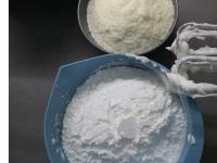 Zucker hineinmischen und dann Kokosraspeln....