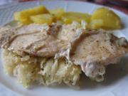 Eingebackene Hühnerbrust mit Sauerkraut 